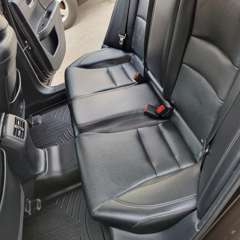 The same rear seat spotless after a complete interior reset